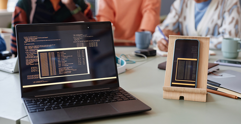 close up of laptop and smartphone with programming 2025 03 08 19 13 45 utc 1